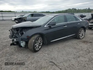 2013 Cadillac XTS Luxury z VIN 2G61P5S38D9231120, wystawiony jako Copart lot #58117975 z przebiegiem 166 726 mil mil oraz Szkoda całkowita • Salvage title. Historia ofert i sprzedaży dostępna na DreamBid. Obrazek 1.