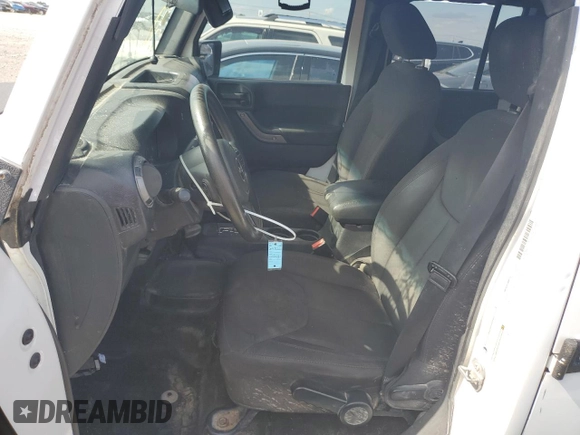 2015 Jeep Wrangler Unlimited Sport с VIN 1C4BJWDG3FL570131, выставлен на аукционе Copart как лот 64418415 с пробегом 112 362 миль миль и Списание • Salvage title. История ставок и продаж доступна на DreamBid. Изображение 7.