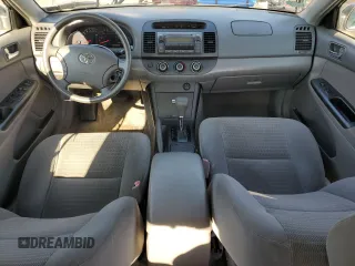 2006 Toyota Camry STD with VIN 4T1BE30K36U711539, listed as a Copart auction lot 65650005 with 135,763 mi miles and Salvage title. Bid and sale history available at DreamBid. Image 8.