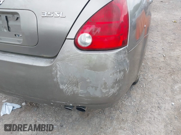 2004 Nissan Maxima SE with VIN 1N4BA41E74C858809, listed as a IAAI auction lot 42436562 with 198,105 mi miles and . Bid and sale history available at DreamBid. Image 6.