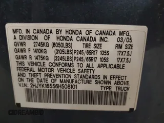 2006 Honda Ridgeline RTL with VIN 2HJYK16556H508101, listed as a IAAI auction lot 41909651 with 301,945 mi miles. Bid and sale history available at carsss.com. Image 9.
