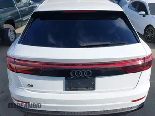 2024 Audi Q8 Premium Plus z VIN WA1BVBF19RD018552, wystawiony jako IAAI lot #41857441 z przebiegiem 3 188 mil mil oraz . Historia ofert i sprzedaży dostępna na DreamBid. Obrazek 17.
