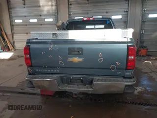 2014 Chevrolet Silverado 1500 LT with VIN 1GCVKREC0EZ130211, listed as a IAAI auction lot 41601900 with 209,604 mi miles and . Bid and sale history available at DreamBid. Image 17.