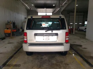 2010 Jeep Liberty Sport with VIN 1J4PN2GK9AW143878, listed as a Copart auction lot 52851095 with 121,357 mi miles and Salvage Title. Bid and sale history available at carsss.com. Image 6.