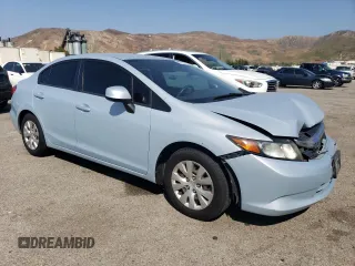 2012 Honda Civic LX с VIN 2HGFB2F56CH524788, выставлен на аукционе Copart как лот 60326815 с пробегом 160 271 миль миль и Списание • Salvage title. История ставок и продаж доступна на DreamBid. Изображение 4.