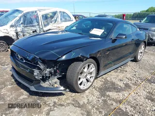 2015 Ford Mustang EcoBoost z VIN 1FA6P8TH3F5353923, wystawiony jako IAAI lot #42182603 z przebiegiem 86 599 mil mil oraz . Historia ofert i sprzedaży dostępna na DreamBid. Obrazek 17.