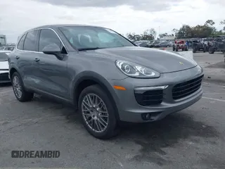 2016 Porsche Cayenne with VIN WP1AA2A27GKA15797, listed as a IAAI auction lot 42063043 with 81,464 mi miles. Bid and sale history available at carsss.com. Image 1.