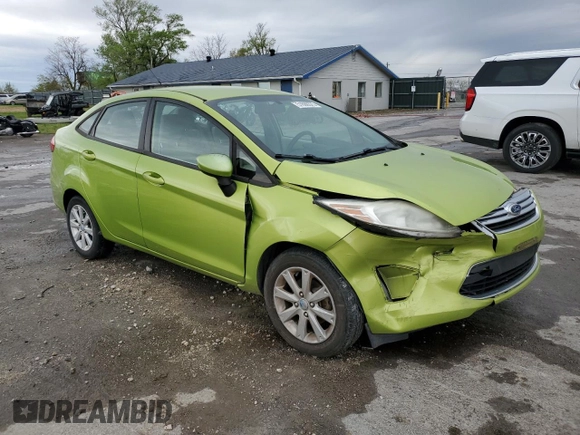 2011 Ford Fiesta SE with VIN 3FADP4BJ4BM147289, listed as a Copart auction lot 51699375 with 113,107 mi miles and Salvage Title. Bid and sale history available at carsss.com. Image 4.
