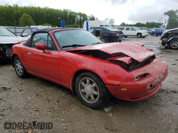 1990 Mazda MX-5 Miata with VIN JM1NA3512L0125981, listed as a Copart auction lot 52803875 with 218,423 mi miles and Clean title. Bid and sale history available at DreamBid. Image 4.