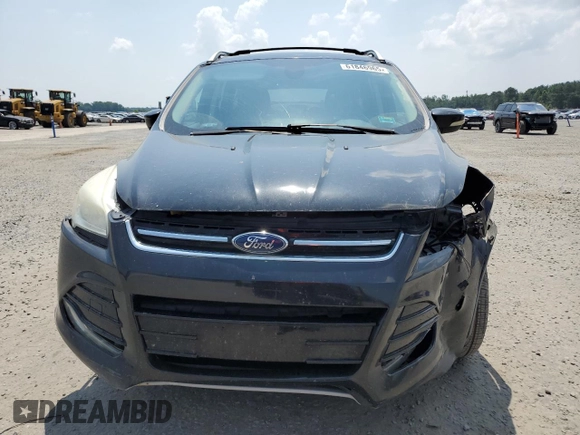 2015 Ford Escape Titanium with VIN 1FMCU0JX7FUA87129, listed as a Copart auction lot 61846965 with 160,044 mi miles and Salvage title. Bid and sale history available at DreamBid. Image 5.