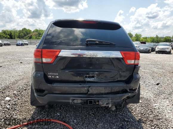 2011 Jeep Grand Cherokee Laredo with VIN 1J4RR4GG6BC538074, listed as a Copart auction lot 60231465 with 203,942 mi miles and Salvage title. Bid and sale history available at DreamBid. Image 6.