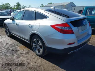 2013 Honda Crosstour EX-L z VIN 5J6TF2H56DL002499, wystawiony jako IAAI lot #42349382 z przebiegiem 174 542 mil mil oraz . Historia ofert i sprzedaży dostępna na DreamBid. Obrazek 3.