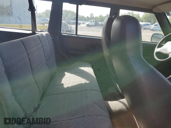 1999 Jeep Cherokee SE with VIN 1J4FF28S0XL541871, listed as a Copart auction lot 59250264 with Not provided miles and Salvage title. Bid and sale history available at DreamBid. Image 11.