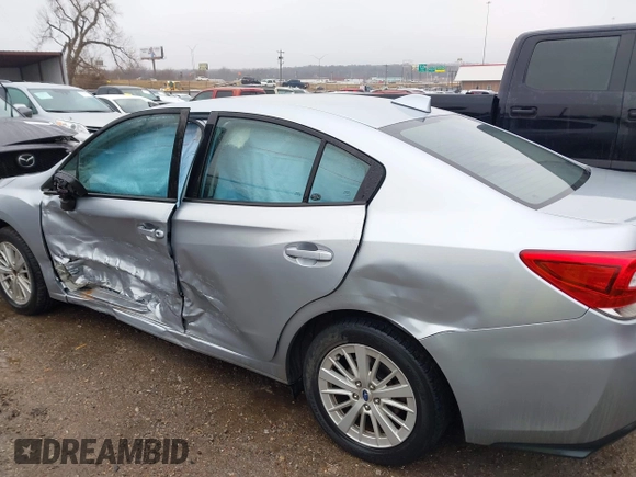 2018 Subaru Impreza Premium z VIN 4S3GKAD64J3600582, wystawiony jako IAAI lot #41456372 z przebiegiem 87 266 mil mil oraz . Historia ofert i sprzedaży dostępna na DreamBid. Obrazek 14.