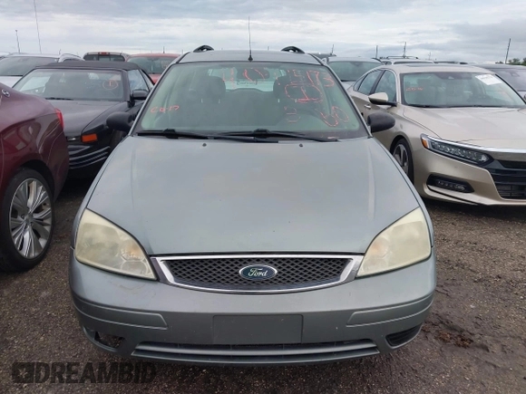 2005 Ford Focus SE with VIN 1FAHP36N65W304897, listed as a IAAI auction lot 40495173 with Not Provided miles and . Bid and sale history available at carsss.com. Image 12.