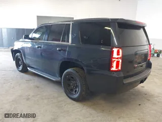 2017 Chevrolet Tahoe Commercial with VIN 1GNLCDECXHR228908, listed as a IAAI auction lot 41537030 with 114,725 mi miles. Bid and sale history available at carsss.com. Image 3.