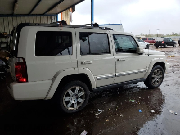 2010 Jeep Commander Limited with VIN 1J4RG5GT0AC137563, listed as a Copart auction lot 54178235 with 146,196 mi miles and Salvage title. Bid and sale history available at DreamBid. Image 3.