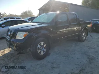 2010 Nissan Frontier LE with VIN 1N6AD0EV1AC407478, listed as a Copart auction lot 82302504 with 146,560 mi miles and Salvage title. Bid and sale history available at DreamBid. Image 1.