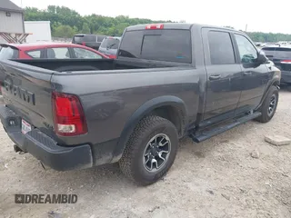 2017 Ram 1500 Rebel with VIN 1C6RR7YT5HS610293, listed as a IAAI auction lot 42454064 with 103,515 mi miles and . Bid and sale history available at DreamBid. Image 4.