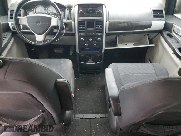 2010 Dodge Grand Caravan SXT with VIN 2D4RN5D12AR244722, listed as a Copart auction lot 43725005 with 210,546 mi miles and Clean Title. Bid and sale history available at DreamBid. Image 8.
