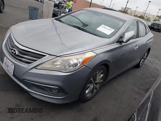 2015 Hyundai Azera • with VIN KMHFG4JG7FA449134, listed as a IAAI auction lot 42024291 with 130,625 mi miles and . Bid and sale history available at carsss.com. Image 2.