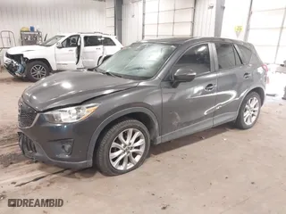 2015 Mazda CX-5 Grand Touring with VIN JM3KE4DYXF0467606, listed as a IAAI auction lot 41345790 with 107,915 mi miles. Bid and sale history available at carsss.com. Image 19.