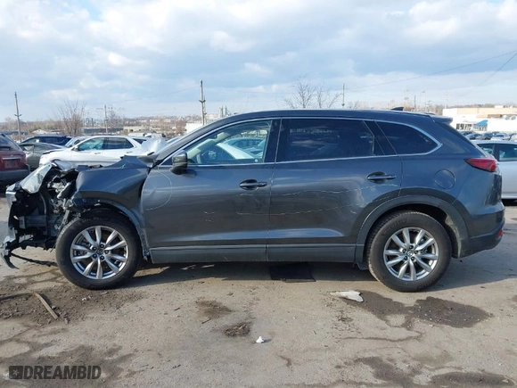 2016 Mazda CX-9 Touring with VIN JM3TCBCY2G0119056, listed as a IAAI auction lot 41268136 with NaN miles. Bid and sale history available at carsss.com. Image 13.