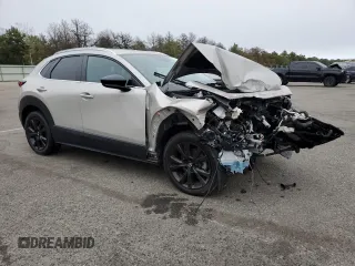 2022 Mazda CX-30 2.5 Turbo with VIN 3MVDMBAY1NM434761, listed as a Copart auction lot 72731244 with 30,331 mi miles and Salvage Title. Bid and sale history available at DreamBid. Image 4.
