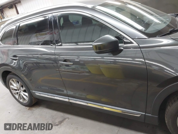 2017 Mazda CX-9 Grand Touring z VIN JM3TCADY2H0134070, wystawiony jako IAAI lot #41611243 z przebiegiem 87 046 mil mil oraz . Historia ofert i sprzedaży dostępna na DreamBid. Obrazek 13.