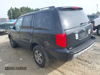 2005 Honda Pilot EX-L with VIN 5FNYF18575B046635, listed as a IAAI auction lot 42096210 with 222,490 mi miles and . Bid and sale history available at carsss.com. Image 3.