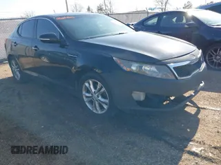 2013 Kia Optima LX with VIN 5XXGM4A72DG192452, listed as a IAAI auction lot 41799889 with 207,290 mi miles. Bid and sale history available at carsss.com. Image 1.