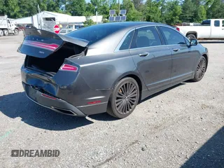 2017 Lincoln MKZ Reserve z VIN 3LN6L5E98HR653592, wystawiony jako IAAI lot #42531248 z przebiegiem 114 188 mil mil oraz . Historia ofert i sprzedaży dostępna na DreamBid. Obrazek 4.