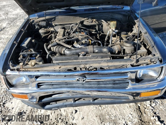 1993 Toyota Pickup DLX z VIN JT4RN93P7P5080335, wystawiony jako Copart lot #84757234 z przebiegiem 162 290 mil mil oraz Szkoda całkowita • Salvage title. Historia ofert i sprzedaży dostępna na DreamBid. Obrazek 11.