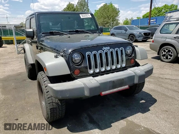 2009 Jeep Wrangler X z VIN 1J4FA24179L716499, wystawiony jako Copart lot #58342675 z przebiegiem 116 871 mil mil oraz Szkoda całkowita • Salvage title. Historia ofert i sprzedaży dostępna na DreamBid. Obrazek 11.