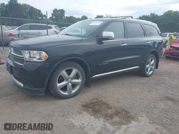 2013 Dodge Durango Citadel with VIN 1C4SDJET3DC563618, listed as a IAAI auction lot 42828144 with 202,648 mi miles and . Bid and sale history available at DreamBid. Image 2.