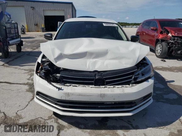 2015 Volkswagen Jetta S with VIN 3VW2K7AJ9FM323047, listed as a Copart auction lot 59098565 with 169,648 mi miles and Salvage title. Bid and sale history available at DreamBid. Image 5.