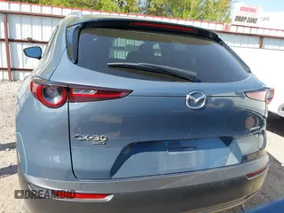2024 Mazda CX-30 S Carbon Edition z VIN 3MVDMBCM6RM682780, wystawiony jako IAAI lot #41882767 z przebiegiem 19 047 mil mil oraz . Historia ofert i sprzedaży dostępna na DreamBid. Obrazek 17.