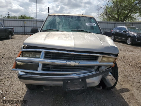 1999 Chevrolet Tahoe Z71 with VIN 1GNEK13R0XJ444734, listed as a Copart auction lot 76323384 with 160,631 mi miles and Salvage Title. Bid and sale history available at carsss.com. Image 5.