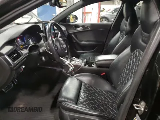 2016 Audi S6 Prestige z VIN WAUH2AFC4GN096343, wystawiony jako Copart lot #68166002 z przebiegiem 111 836 mil mil oraz . Historia ofert i sprzedaży dostępna na DreamBid. Obrazek 7.