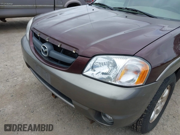 2001 Mazda Tribute LX with VIN 4F2CU08141KM10269, listed as a IAAI auction lot 42138704 with 166,825 mi miles and . Bid and sale history available at carsss.com. Image 6.