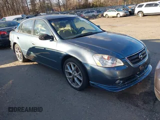 2002 Nissan Altima SE with VIN 1N4BL11E62C115936, listed as a IAAI auction lot 41593574 with 999,999 mi miles. Bid and sale history available at carsss.com. Image 1.