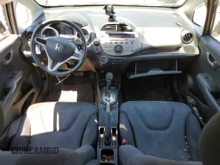 2011 Honda Fit Sport with VIN JHMGE8H57BC024827, listed as a Copart auction lot 59704194 with 146,316 mi miles and Salvage Title. Bid and sale history available at DreamBid. Image 8.
