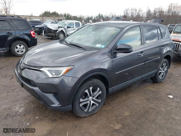 2018 Toyota RAV4 LE with VIN JTMBFREV8JJ184809, listed as a IAAI auction lot 41901048 with 76,699 mi miles. Bid and sale history available at carsss.com. Image 2.