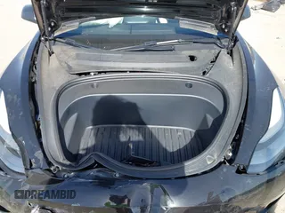 2023 Tesla Model 3 z VIN 5YJ3E1EA7PF465540, wystawiony jako IAAI lot #42261848 z przebiegiem 15 885 mil mil oraz . Historia ofert i sprzedaży dostępna na DreamBid. Obrazek 10.