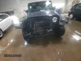 2013 Jeep Wrangler Unlimited Sport z VIN 1C4BJWDG5DL529707, wystawiony jako Copart lot #48436325 z przebiegiem 142 661 mil mil oraz Szkoda całkowita • Salvage title. Historia ofert i sprzedaży dostępna na DreamBid. Obrazek 14.