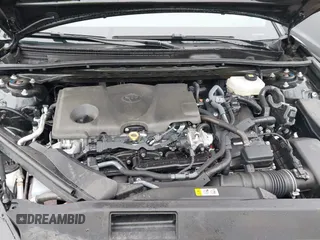 2025 Toyota Camry LE z VIN 4T1DBADK7SU513802, wystawiony jako IAAI lot #42259217 z przebiegiem 27 379 mil mil oraz . Historia ofert i sprzedaży dostępna na DreamBid. Obrazek 10.