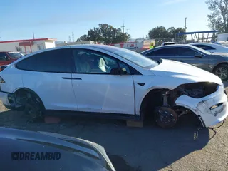 2022 Tesla Model X with VIN 7SAXCBE56NF329657, listed as a IAAI auction lot 41400629 with Not Provided miles and . Bid and sale history available at DreamBid. Image 14.