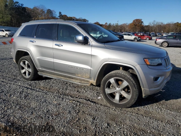 2014 Jeep Grand Cherokee Overland with VIN 1C4RJFCG0EC226397, listed as a Copart auction lot 80295784 with 131,921 mi miles and Salvage Title. Bid and sale history available at DreamBid. Image 4.
