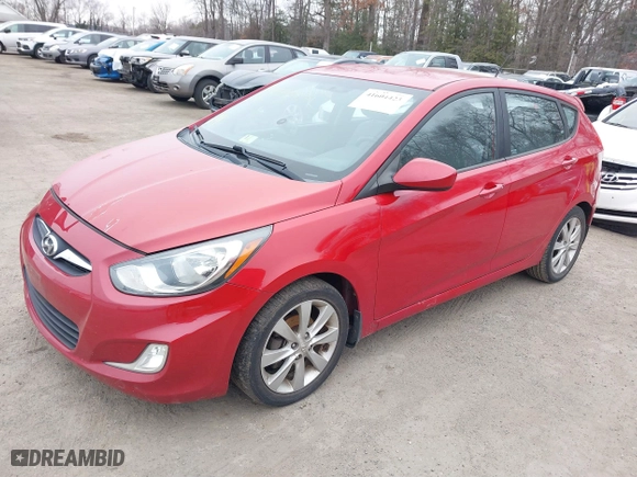 2012 Hyundai Accent SE with VIN KMHCU5AE7CU034423, listed as a IAAI auction lot 41604423 with 165,266 mi miles. Bid and sale history available at carsss.com. Image 17.