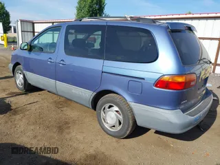 2000 Toyota Sienna LE with VIN 4T3ZF13C2YU183815, listed as a IAAI auction lot 42462319 with 217,175 mi miles and . Bid and sale history available at DreamBid. Image 3.